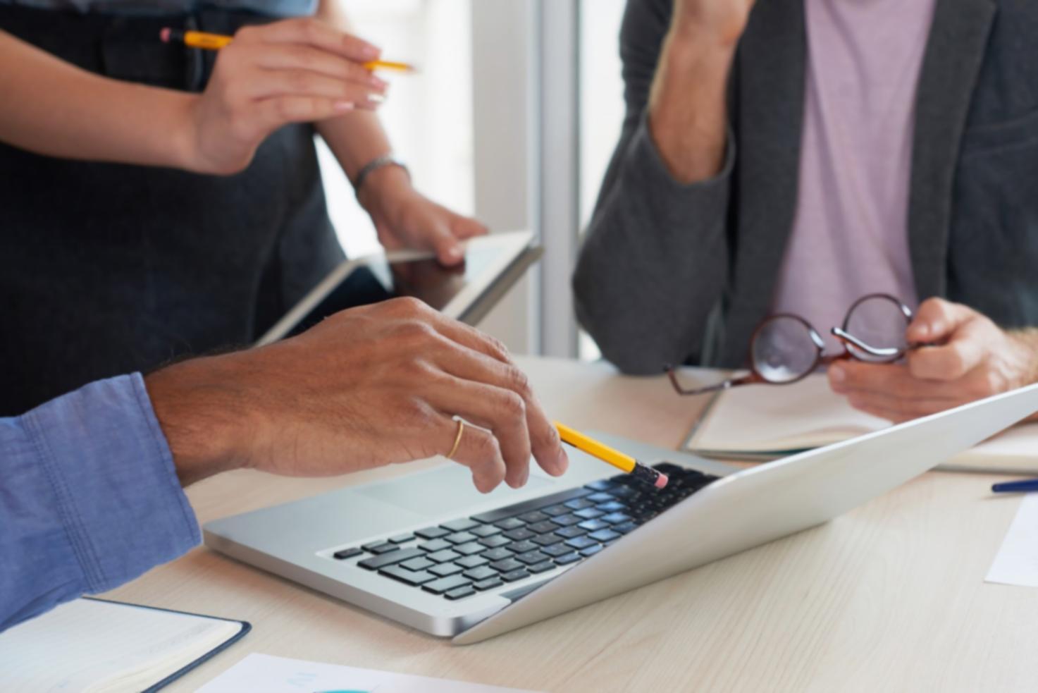 Professional training environment with financial charts and planning materials